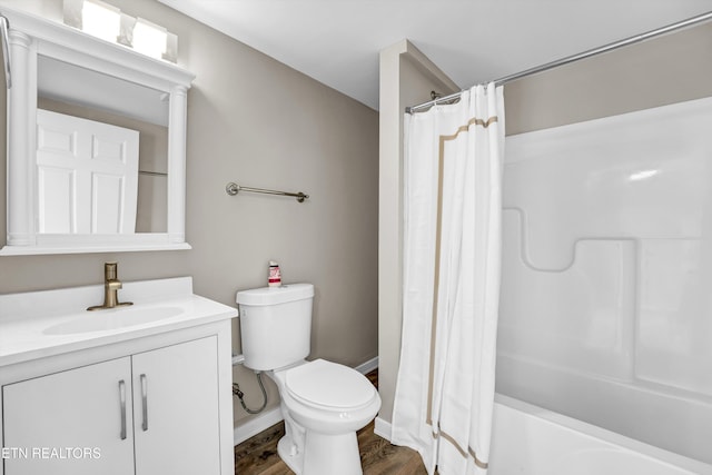 full bathroom with vanity, toilet, wood-type flooring, and shower / tub combo with curtain