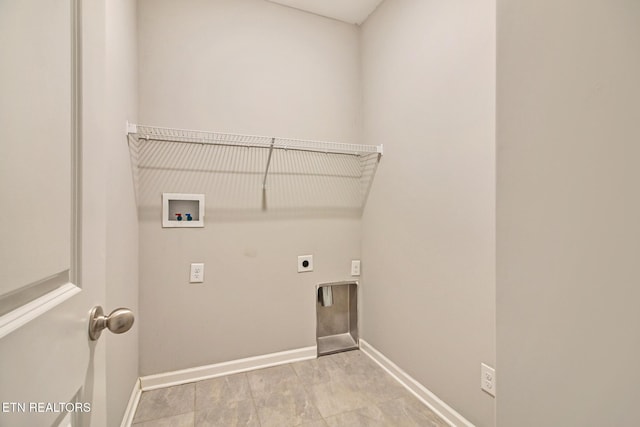 clothes washing area featuring hookup for an electric dryer and hookup for a washing machine