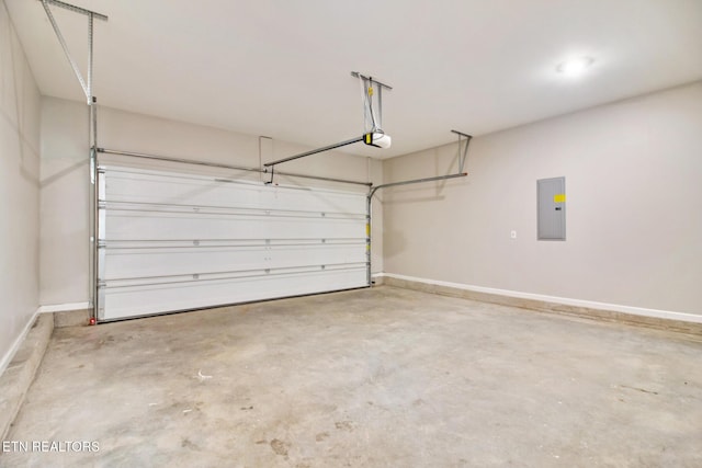 garage featuring electric panel and a garage door opener