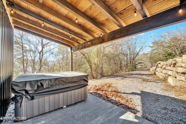 view of patio / terrace featuring a hot tub