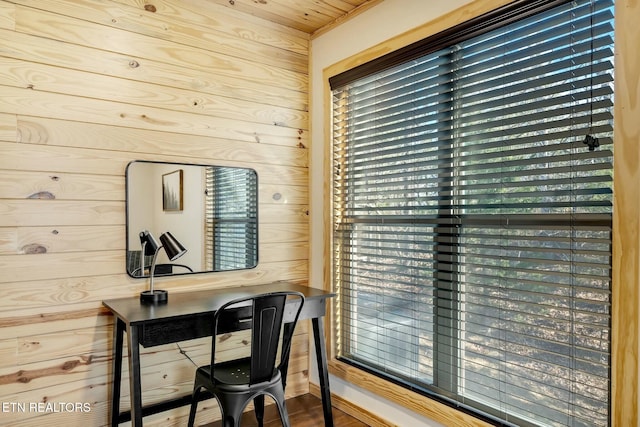 home office with wood walls