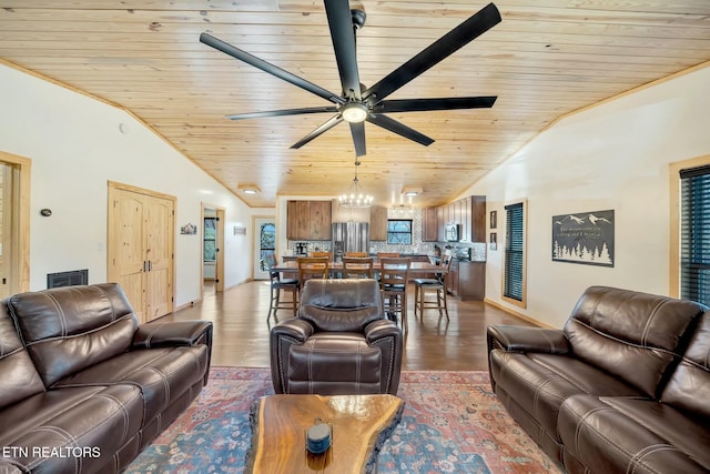 living room with ceiling fan with notable chandelier, hardwood / wood-style flooring, vaulted ceiling, and wood ceiling