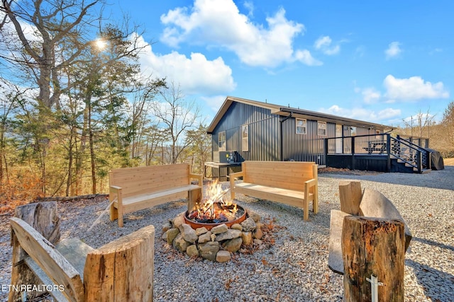 exterior space featuring a fire pit