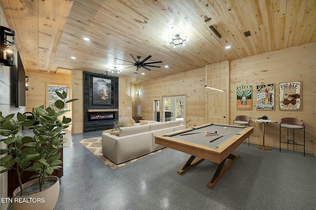 recreation room featuring ceiling fan, wood walls, wooden ceiling, and billiards