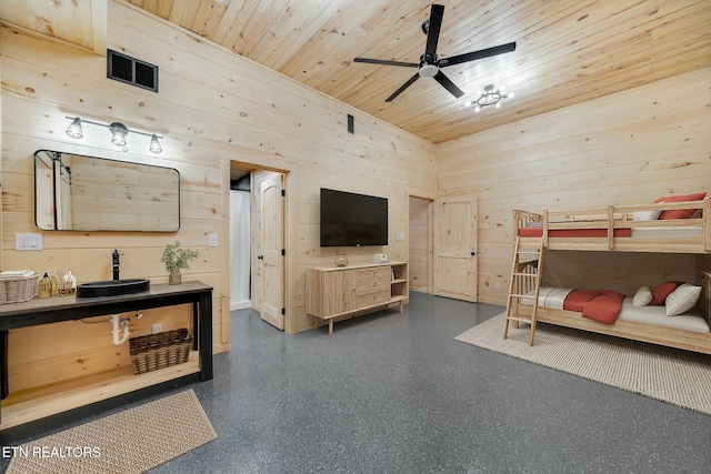 bedroom with wooden walls, a towering ceiling, wooden ceiling, and ceiling fan