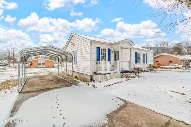 view of front of home featuring a carport