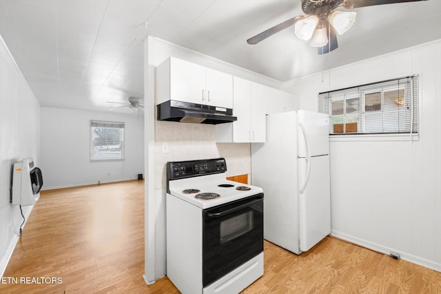 kitchen with ceiling fan, heating unit, light hardwood / wood-style floors, white appliances, and white cabinets