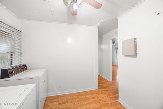 washroom with washer and dryer, light hardwood / wood-style floors, crown molding, and ceiling fan