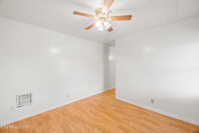 unfurnished room with light wood-type flooring, ceiling fan, and ornamental molding