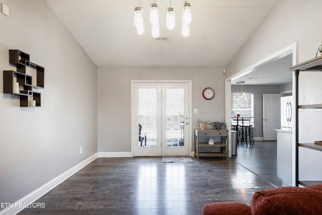 interior space with a healthy amount of sunlight and dark wood-type flooring