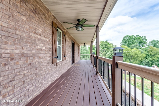 deck featuring ceiling fan and covered porch