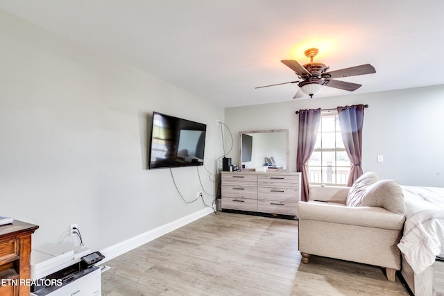 interior space featuring light hardwood / wood-style floors and ceiling fan