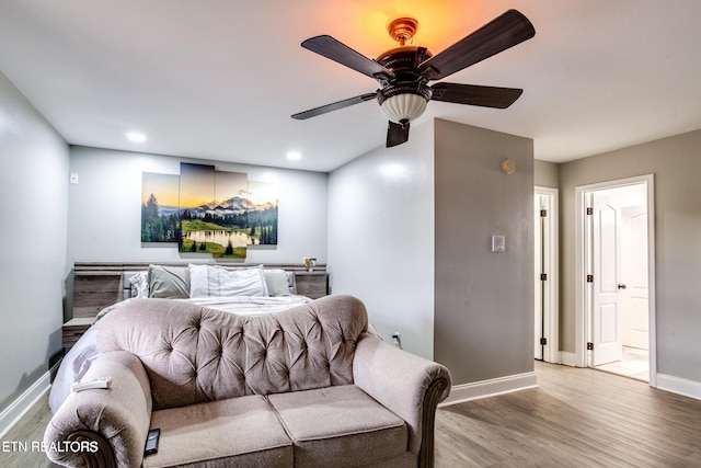 bedroom featuring ceiling fan and light wood-type flooring