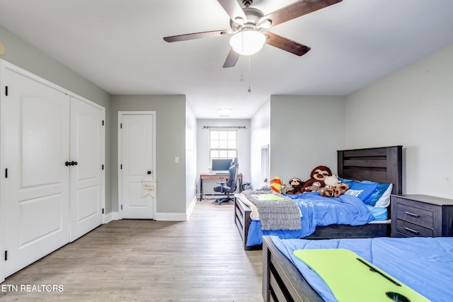 bedroom featuring ceiling fan and light wood-type flooring