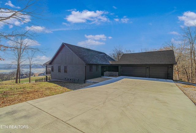 view of front of house with a front lawn and a garage