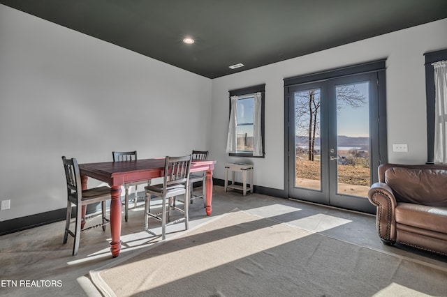 dining area with concrete floors