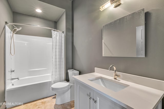 full bathroom featuring shower / bath combo with shower curtain, vanity, and toilet