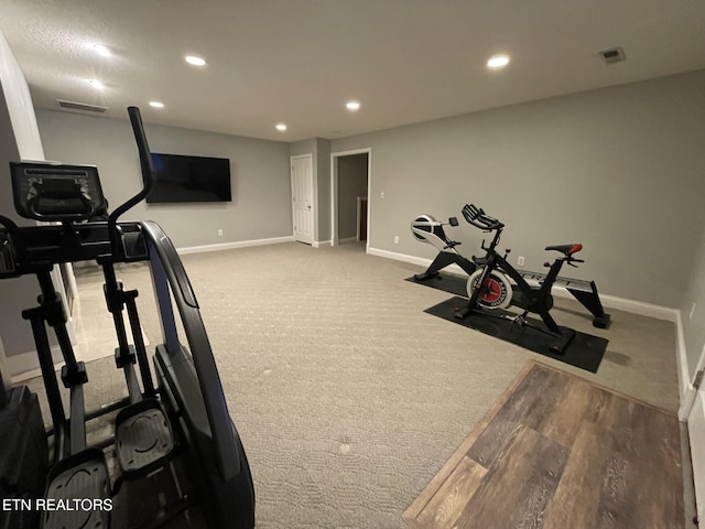 exercise area with carpet flooring