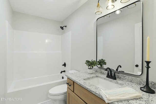 full bathroom with vanity, shower / bathtub combination, and toilet