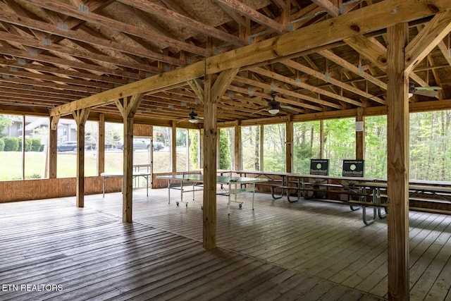 surrounding community featuring ceiling fan and a wooden deck