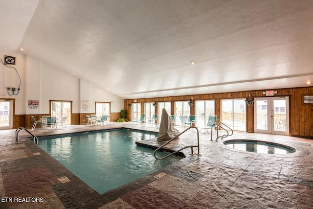 view of pool featuring french doors