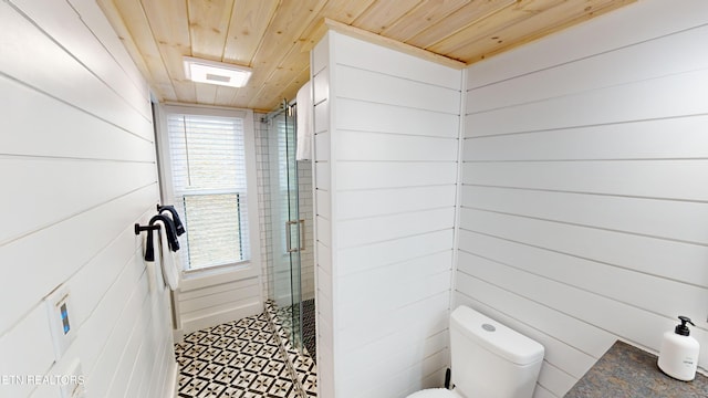 bathroom featuring toilet, wood ceiling, walk in shower, and wooden walls