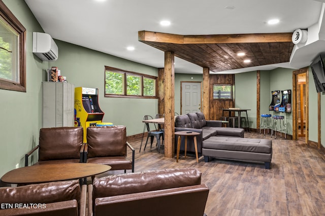 living room featuring wood-type flooring and a wall mounted AC