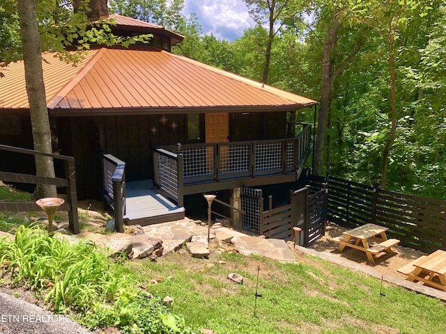 view of front of house with a wooden deck