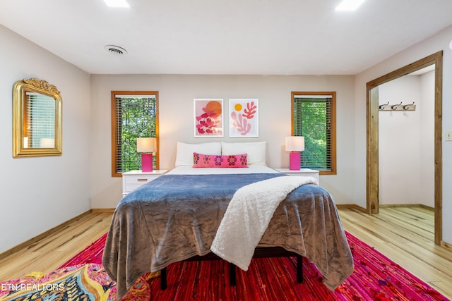 bedroom featuring light wood-type flooring