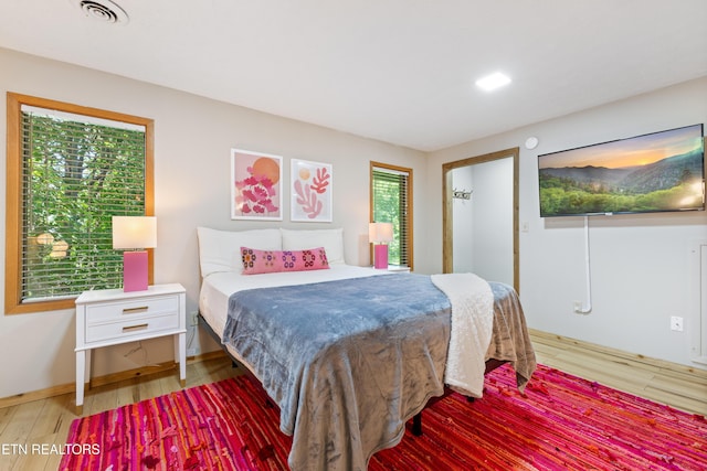 bedroom featuring hardwood / wood-style floors