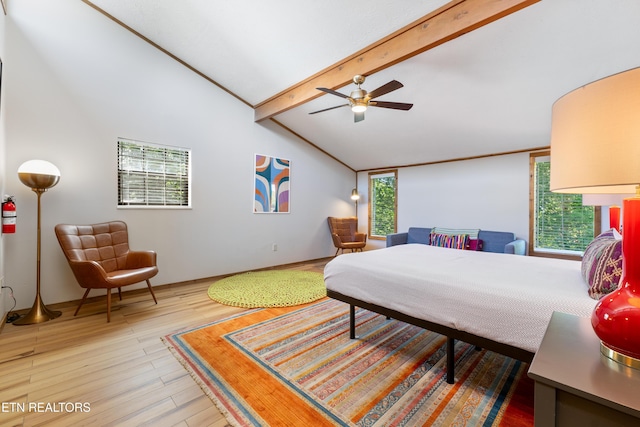 bedroom with hardwood / wood-style flooring, lofted ceiling with beams, and ceiling fan