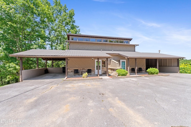 view of front facade with a carport