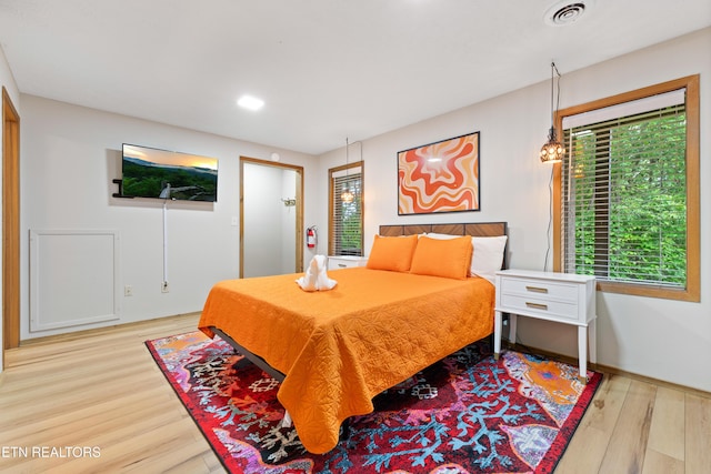 bedroom featuring light hardwood / wood-style flooring