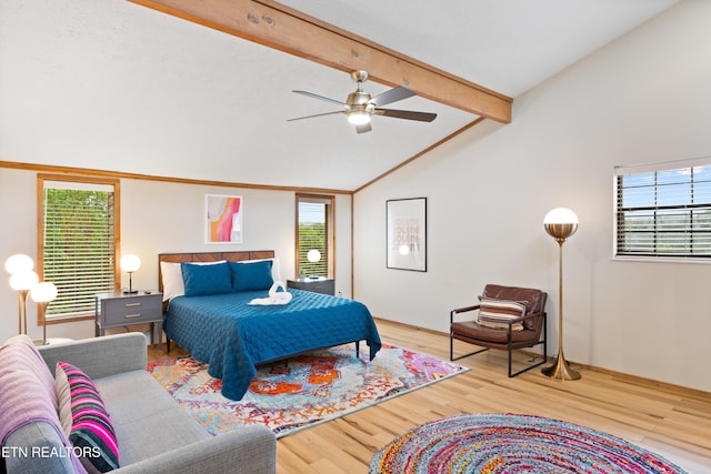 bedroom with multiple windows, vaulted ceiling with beams, light hardwood / wood-style flooring, and ceiling fan