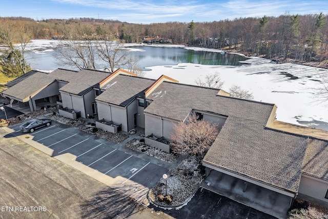 drone / aerial view with a water view