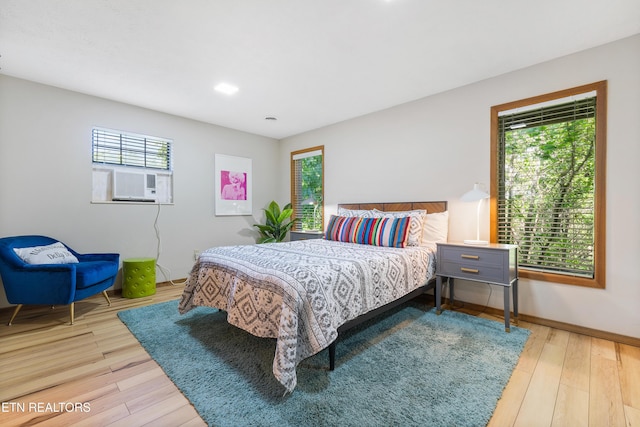 bedroom featuring hardwood / wood-style flooring