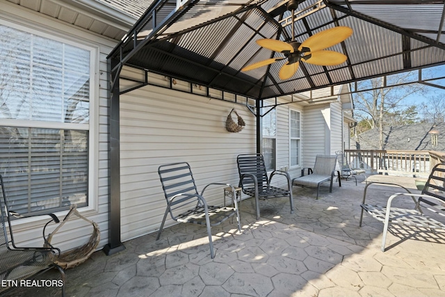 view of patio with a gazebo and ceiling fan