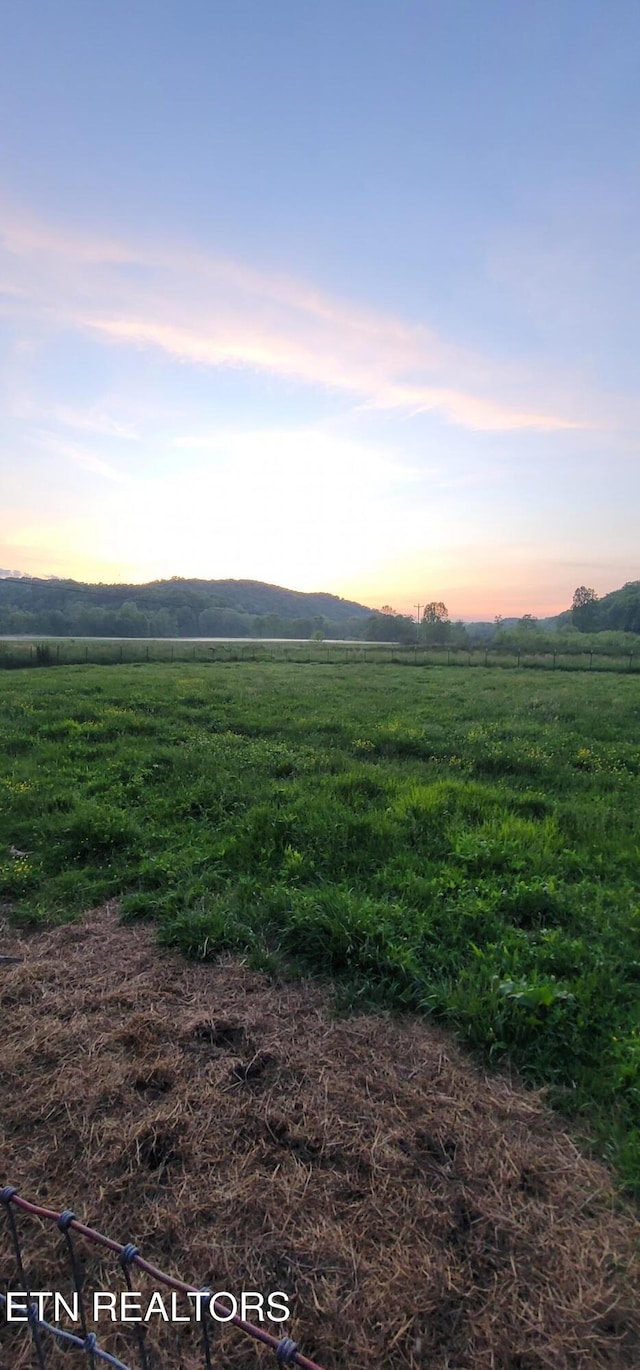 exterior space with a rural view