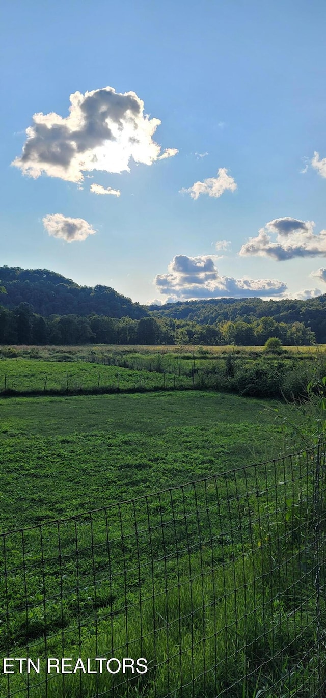 view of mountain feature featuring a rural view