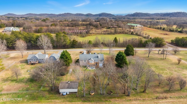 birds eye view of property featuring a mountain view and a rural view