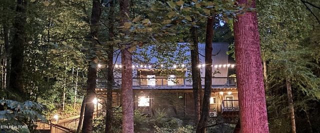 view of property exterior featuring a balcony