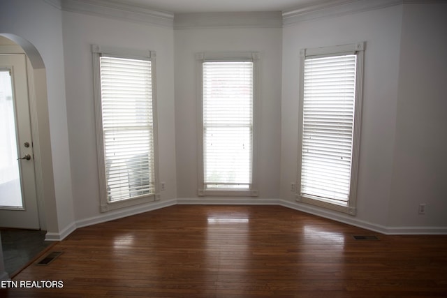 spare room with dark hardwood / wood-style floors