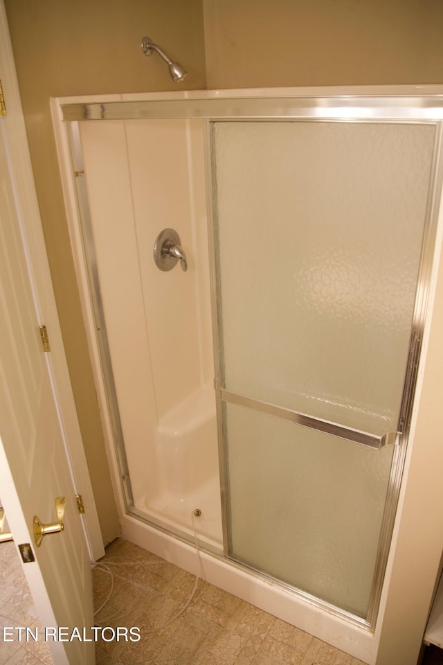 bathroom featuring walk in shower