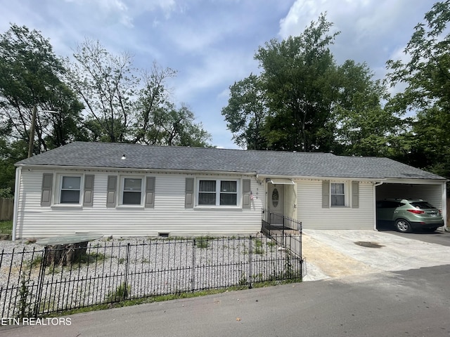 single story home with a carport