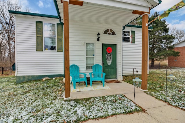 doorway to property featuring a patio area