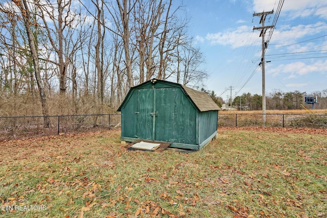 view of outdoor structure with a lawn