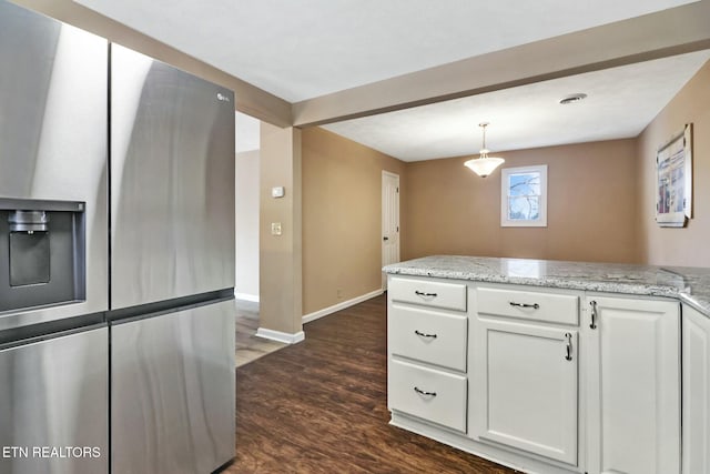 kitchen featuring decorative light fixtures, white cabinets, stainless steel fridge with ice dispenser, light stone countertops, and dark hardwood / wood-style floors