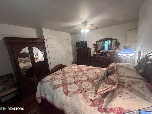 bedroom featuring ceiling fan and a closet