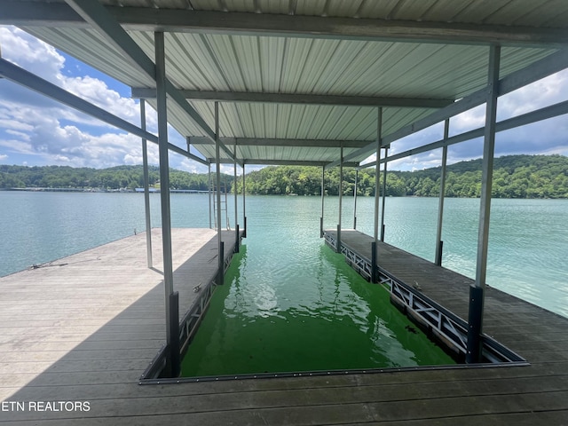 view of dock featuring a water view