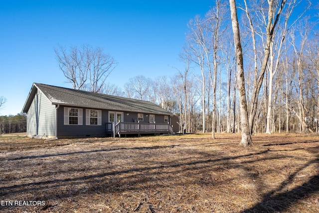 view of front of home with a wooden deck